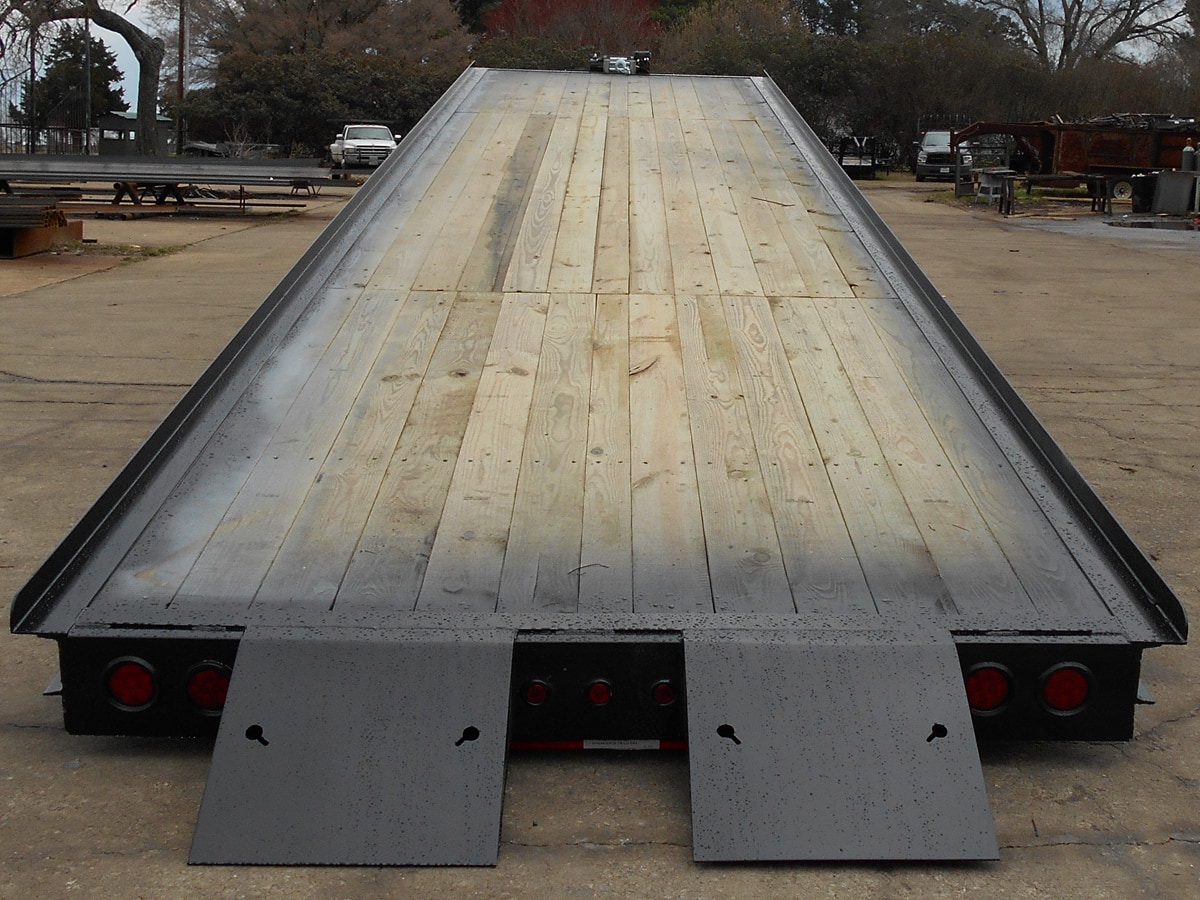 Rear View of a Black, 35 Foot, Hydraulic Gooseneck Container Hauler built by Custom Built Gooseneck Trailers