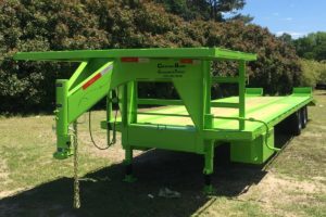 Green, 35 Foot, Pierced Frame Upper Deck Trailer with a Tool Box and HD Ramps built by Custom Built Gooseneck Trailers