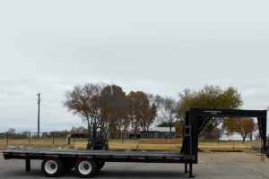 Side View of a Specialty Trailer with a Custom Tall Neck built by Custom Built Gooseneck Trailers