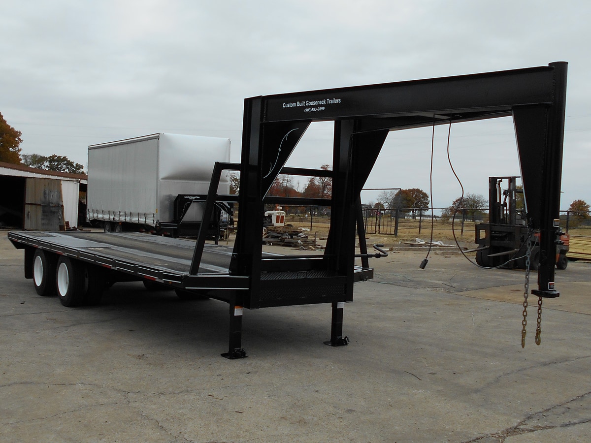 Front View of a Specialty Trailer with a Custom Tall Neck built by Custom Built Gooseneck Trailers