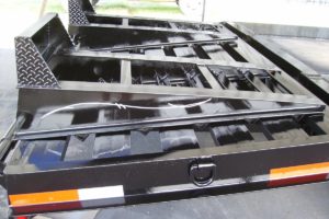 Black Pintle Hitch Trailer with Ramps built by Custom Built Gooseneck Trailers