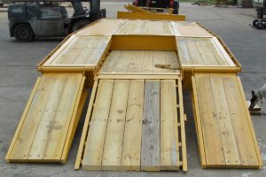 Yellow Pintle Hitch Trailer with Three Ramps built by Custom Built Gooseneck Trailers