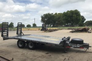 Black Pintle Hitch Trailer with Ramps built by Custom Built Gooseneck Trailers